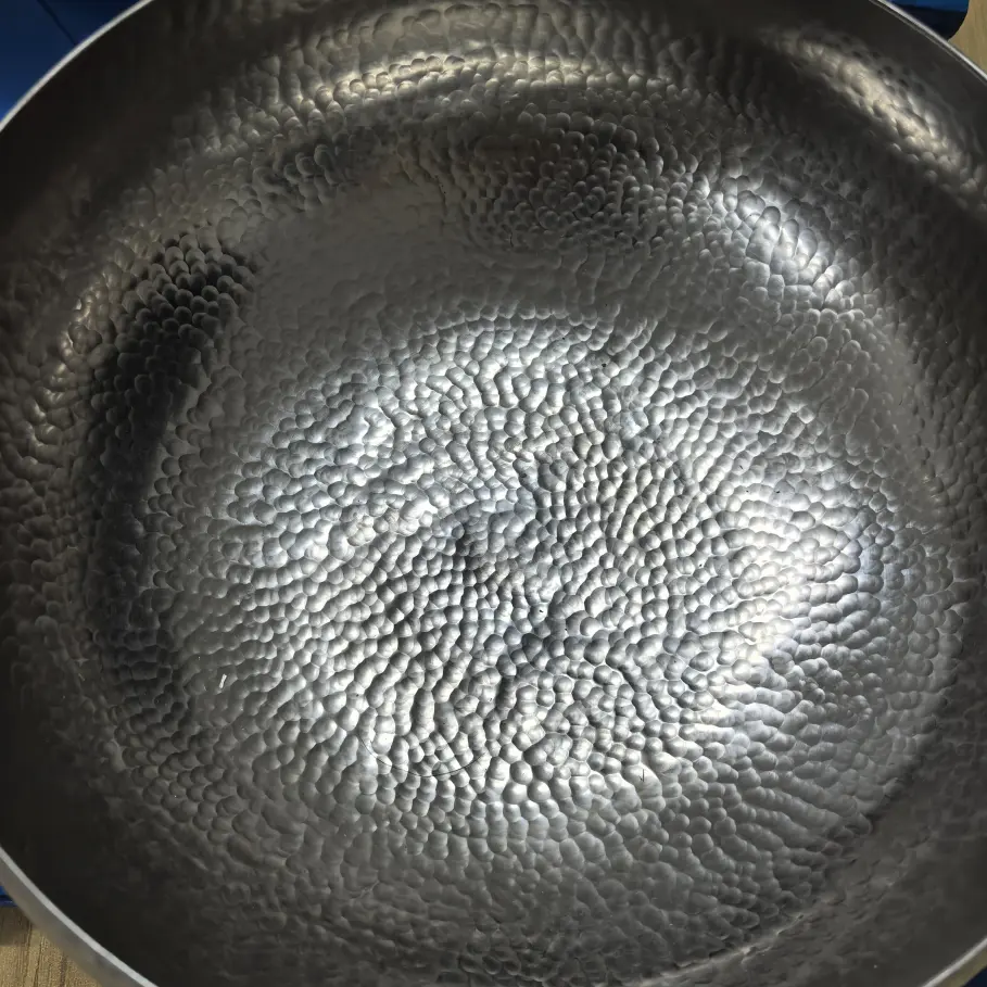 Custom fabricated hammered stainless steel decorative metal form