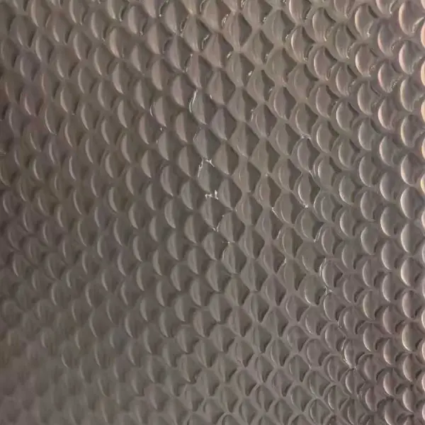 Hammered stainless steel sheet with fine repeating textured pattern
