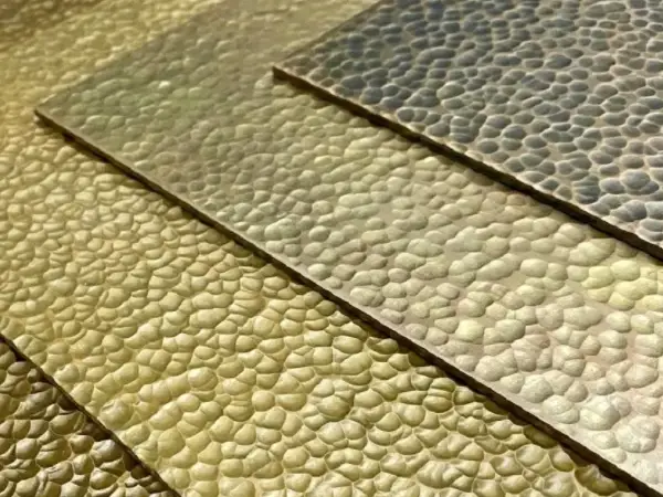 Hammered stainless steel sheet with decorative texture